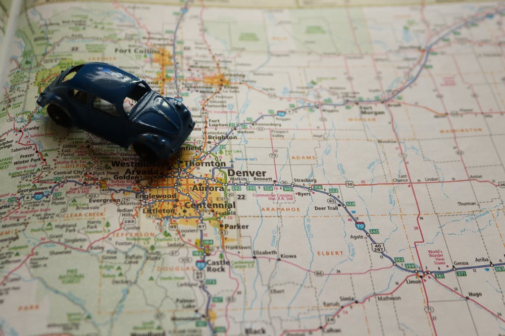 A car on a map depicting good local seo visibility for your website