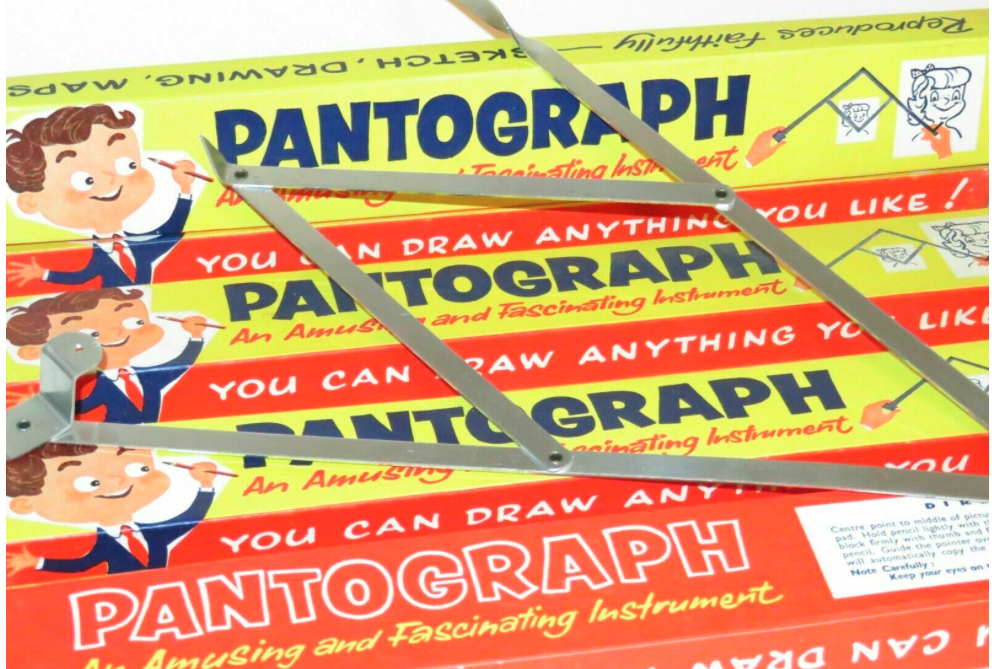 A childs metal pantograph for enlarging and reducing images