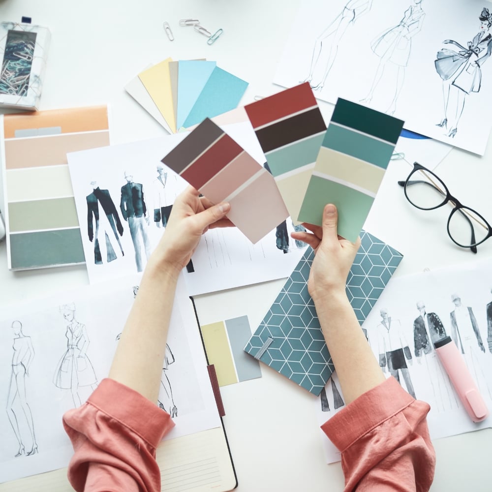 Woman choosing colors for a fashion design