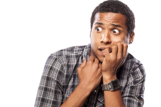 Black guy looking scared