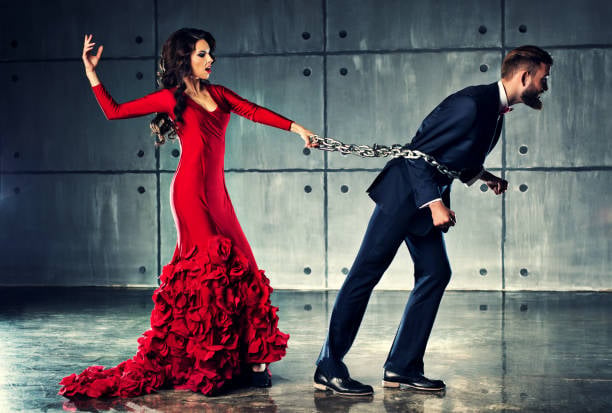 Guy trying to get away from a woman