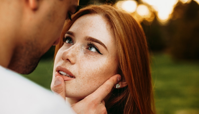 man looking into a woman's eyes