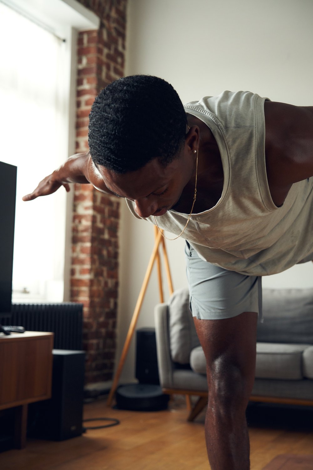 Black man doing yoga