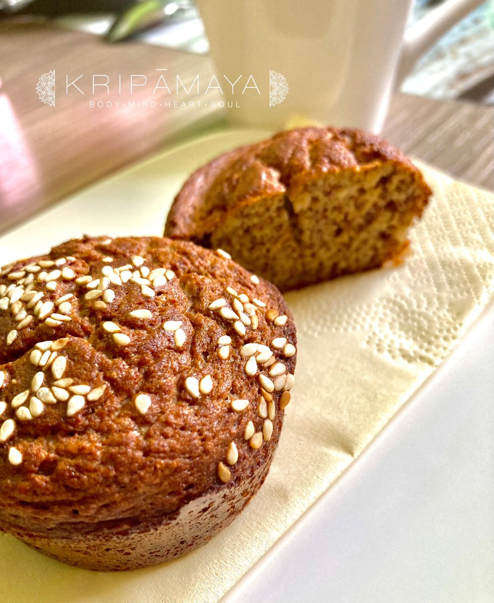 Muffin on a plate with a cup