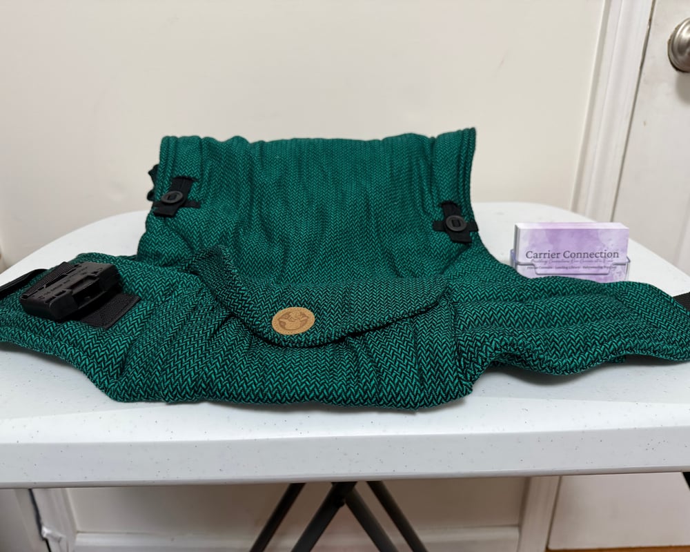 LennyHybrid on a table featuring the buckle belt with quilted padding