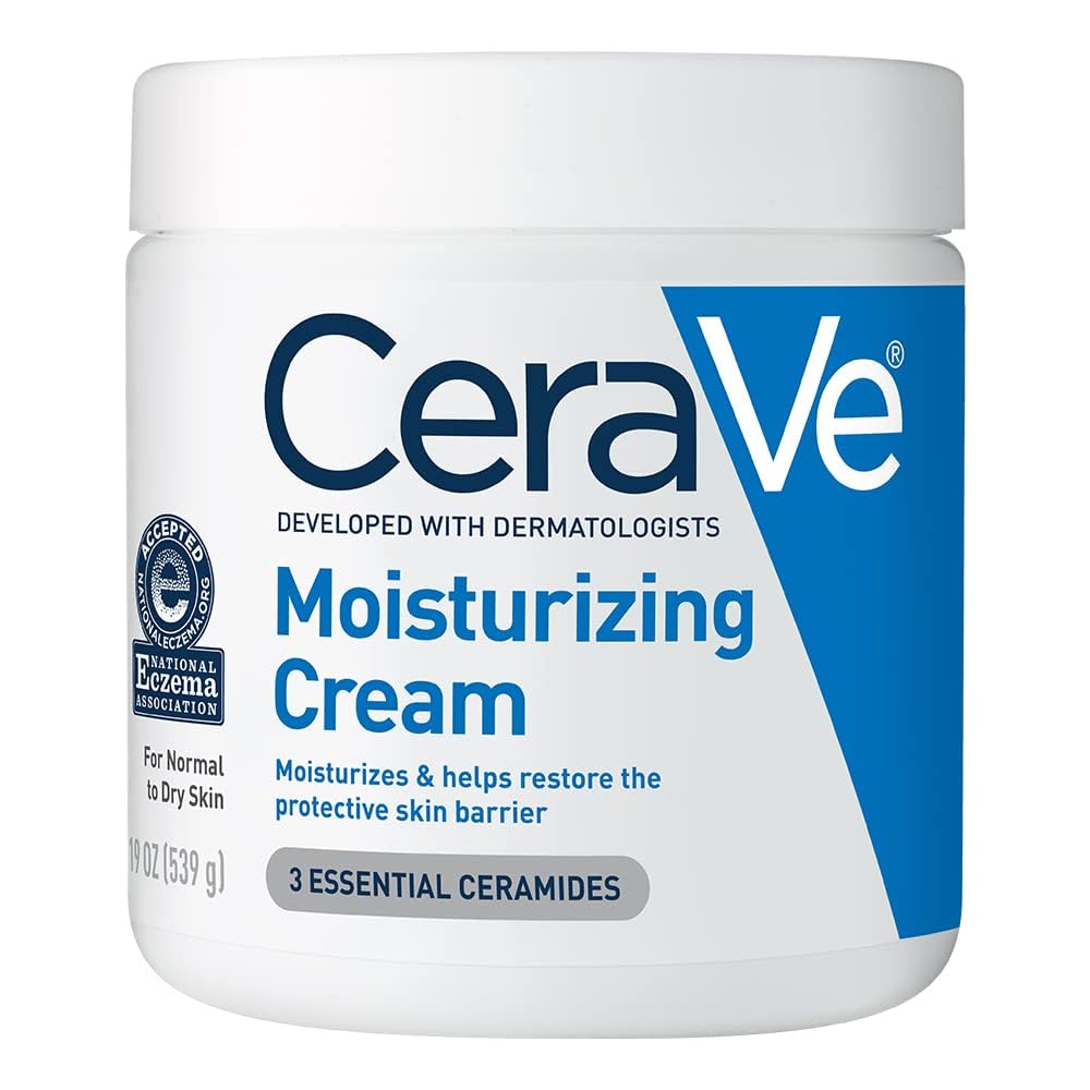 A white jar of CeraVe Moisturizing Cream, a body moisturizer for dry skin, features blue label text and the National Eczema Association seal. The front highlights “3 essential ceramides” and its ability to moisturize and restore the skin barrier.