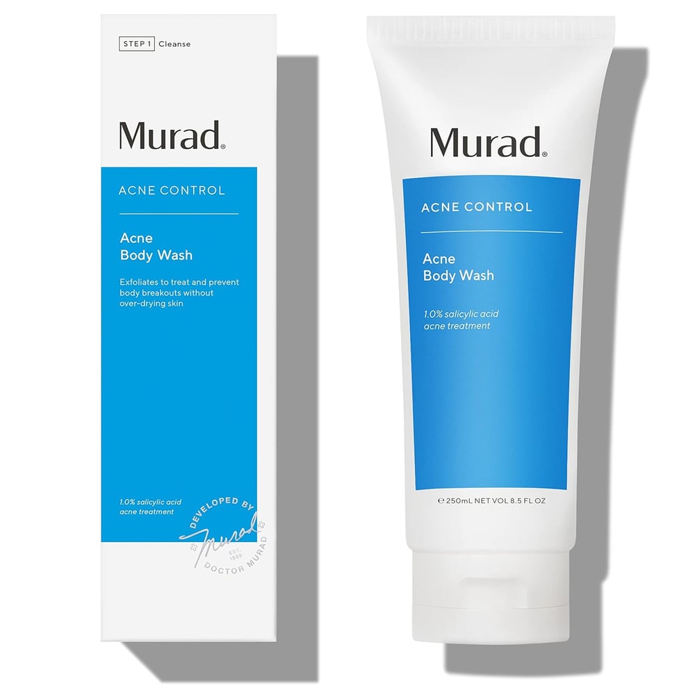 Murad Acne Control Acne Body Wash in a white and blue tube, shown next to its matching box. Both highlight salicylic acid for exfoliating, treating body breakouts, and targeting blackhead-prone skin.