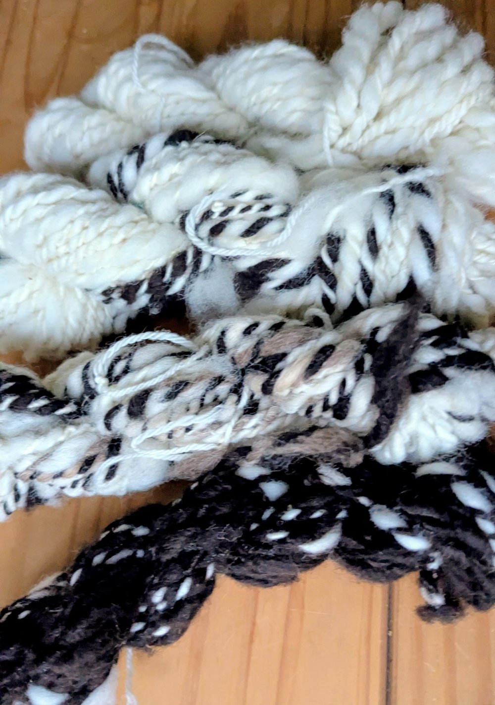 four skeins of hand spun british breed wool