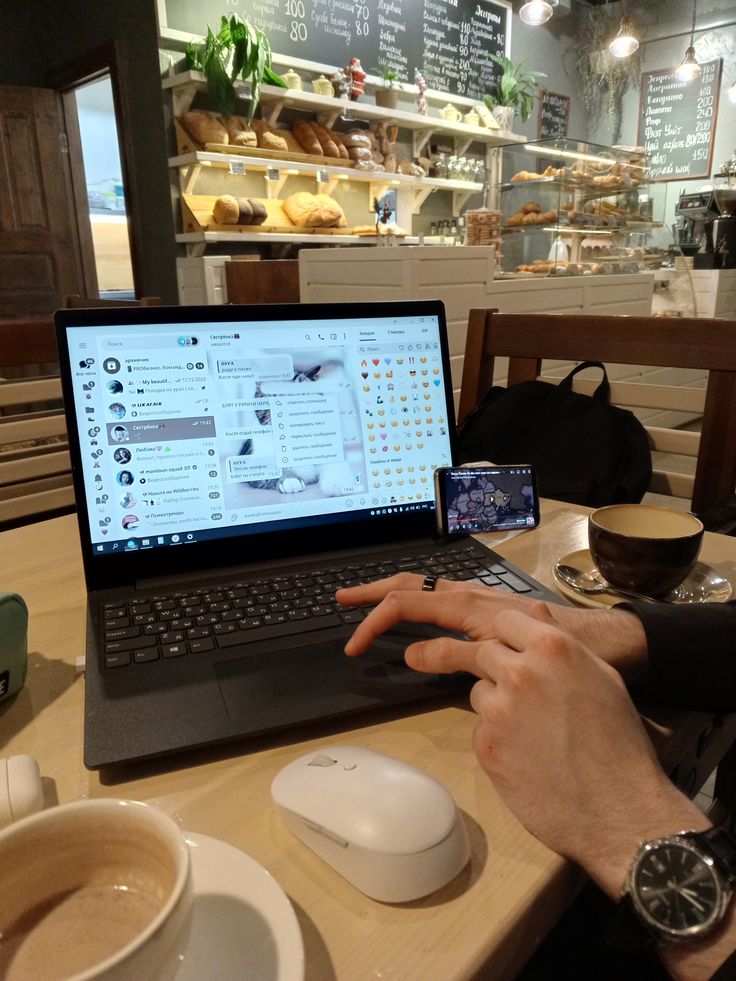 a student creating digital products on a laptop