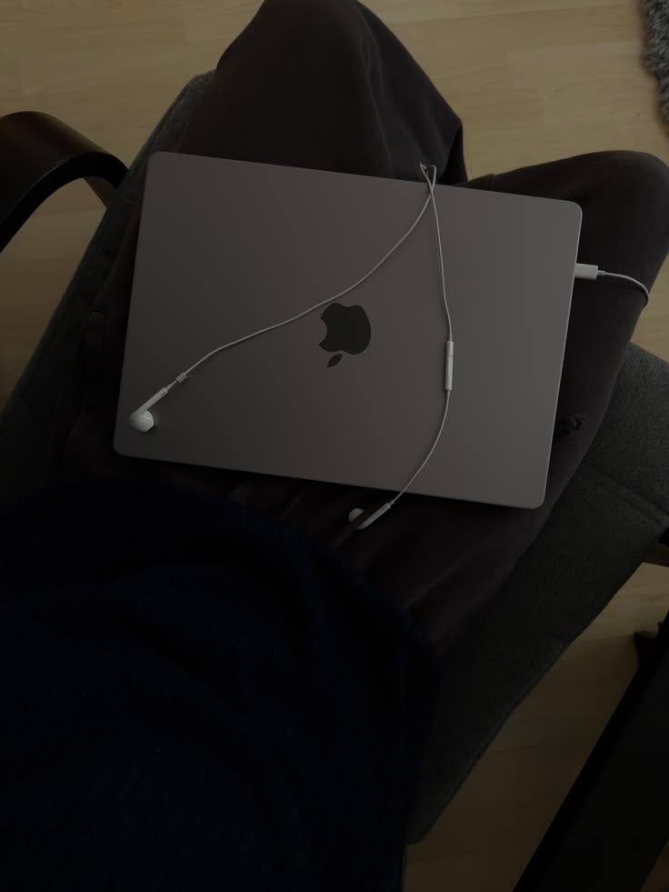 a student creating digital products on a laptop