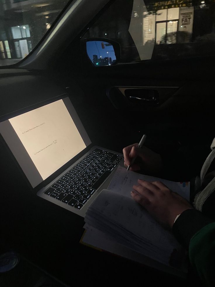 a student creating digital products on a laptop