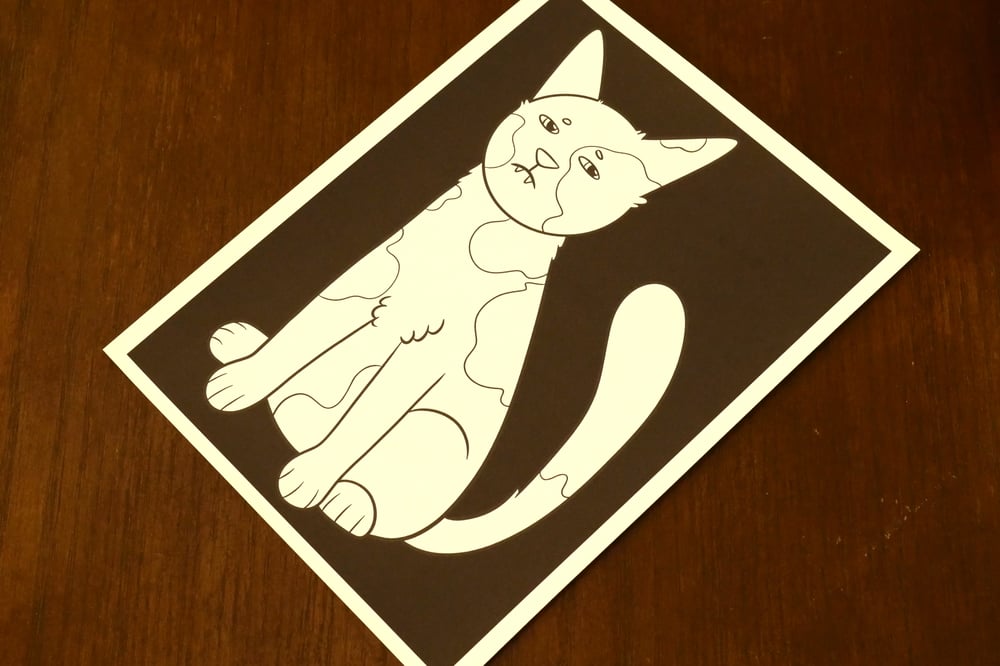 A black and white coloring sheet showing a cat.