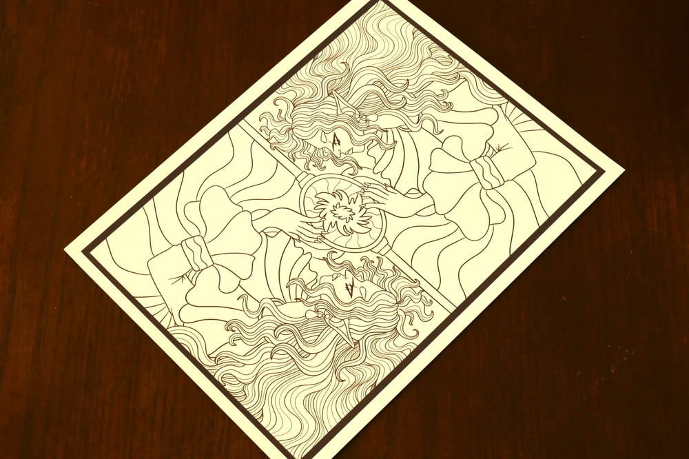 A black and white coloring sheet showing to elven women.