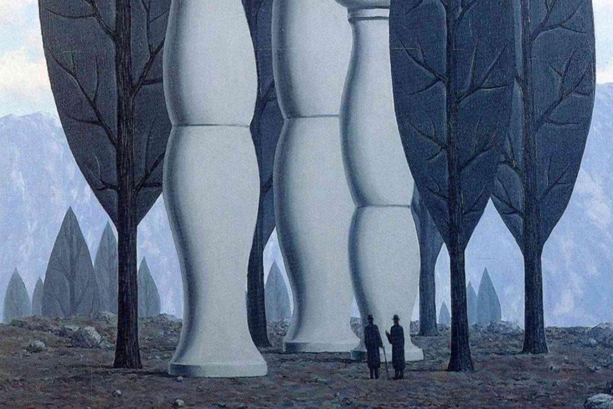 Artwork: The art of conversation by Rene Magritte depicts a forest where some three of the trees are white pillars. There are two men, tiny compared to the trees and pillars, who are standing in front of the pillars.