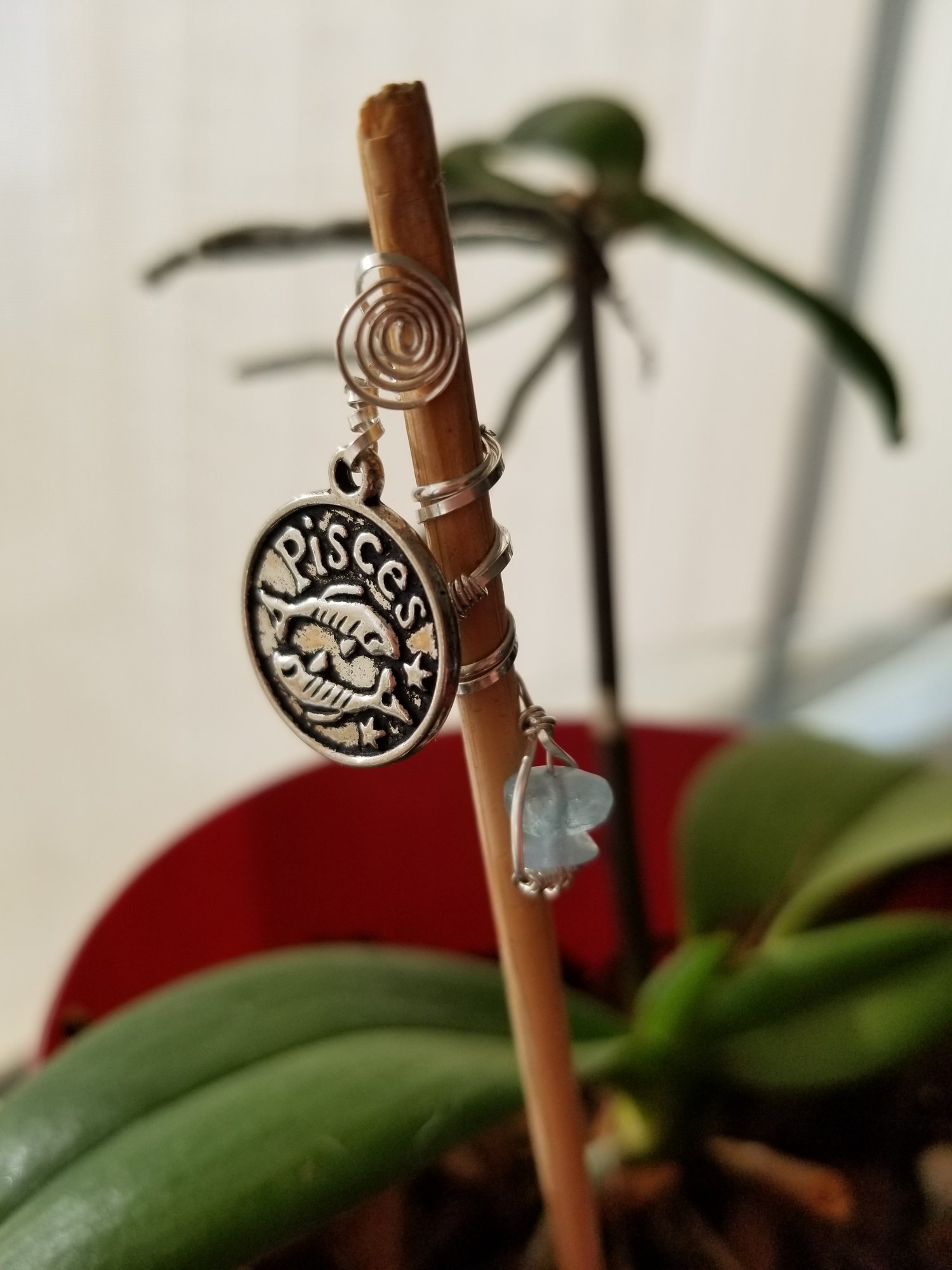 Sterling Silver loc jewel with aquamarine semi=precious stone