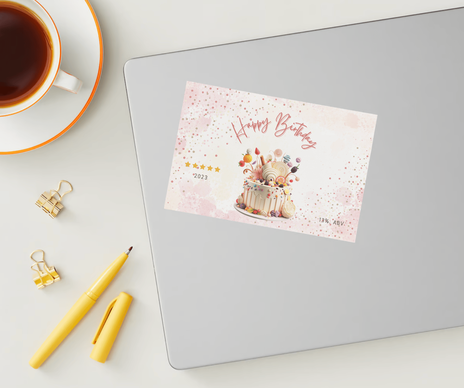 Whimsical Birthday Cake Design Sticker Label 6"x4" | Customizable Canva Template | Digital. Mock sticker on laptop