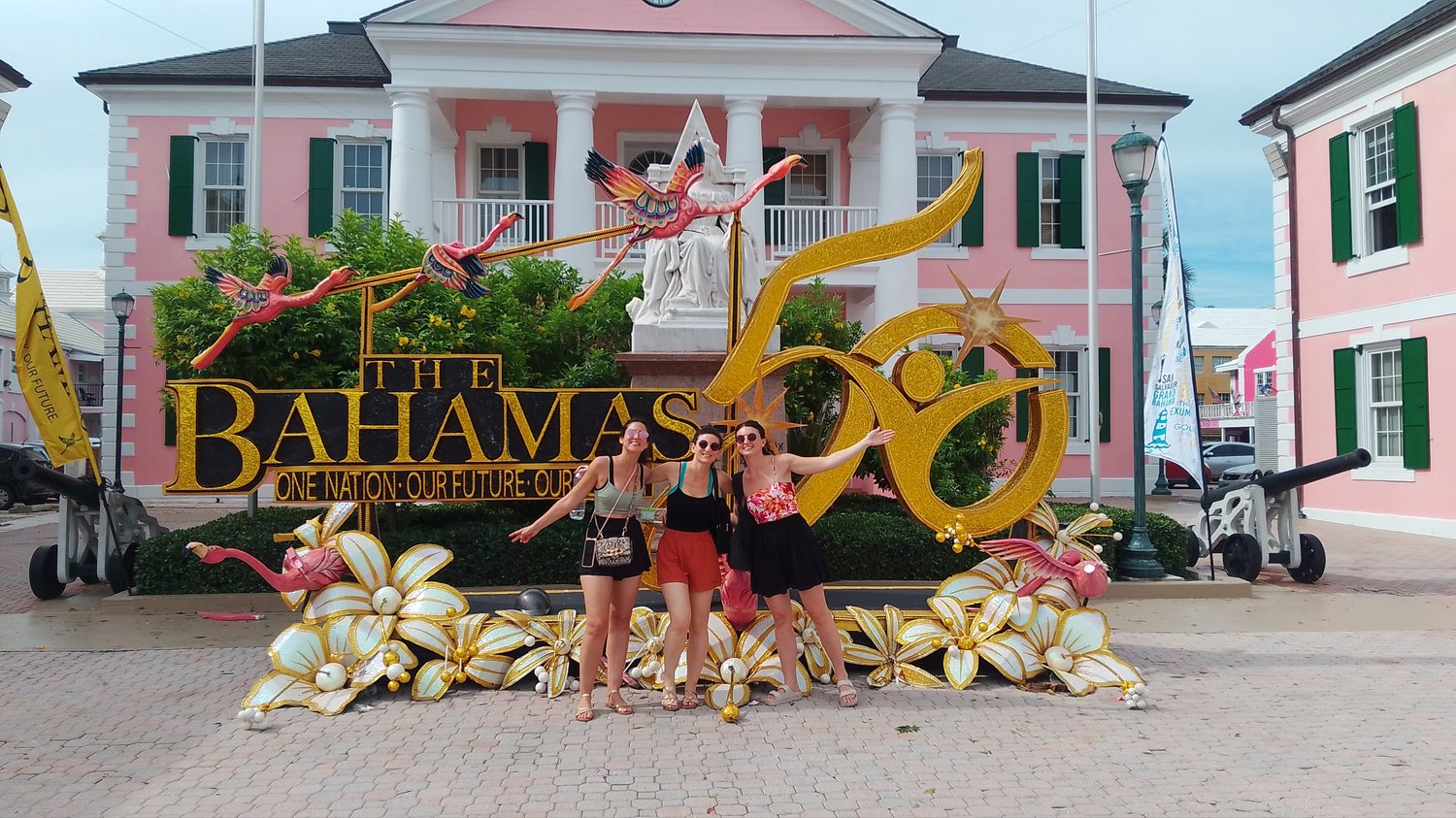 KINDWalk, Nassau tour, Nassau walking tour, walking tour Nassau, free walking tour, walking tour, Bahamas tour, French sisters, colorful sign, GrayCliff Heritage village, Bahama Barrels, things to do in Nassau, free things to do, world famous straw market, Nassau straw market, Bay street, Nassau Bahamas