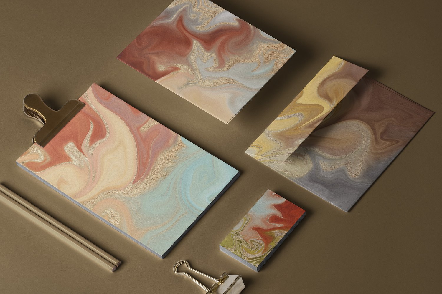 marbled background textures reminiscent of agate or geode stones with glittering gold accents in a wide variety of colors.