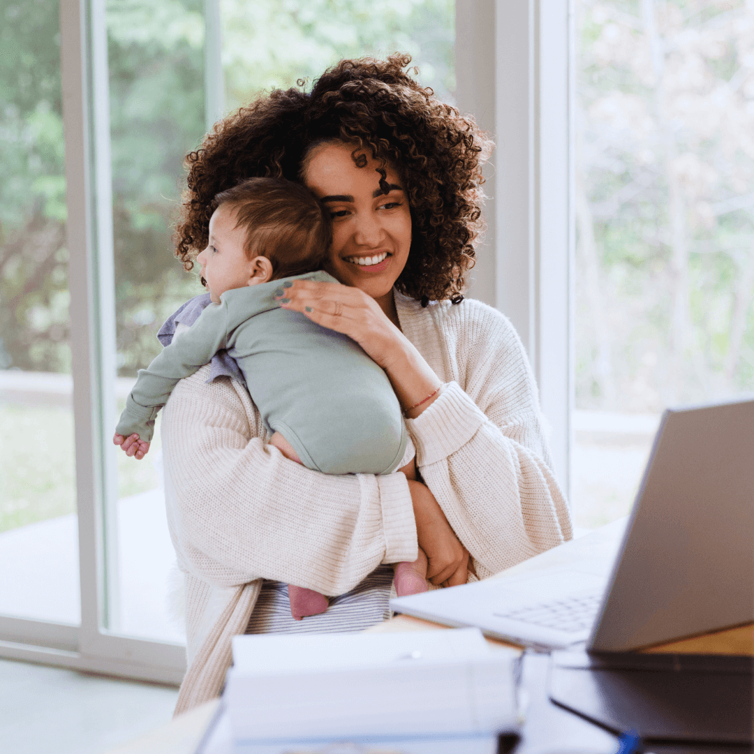 Happy mom smiling and embracing her joyful son in a heartwarming moment of love and connection. A beautiful expression of motherhood and family happiness.