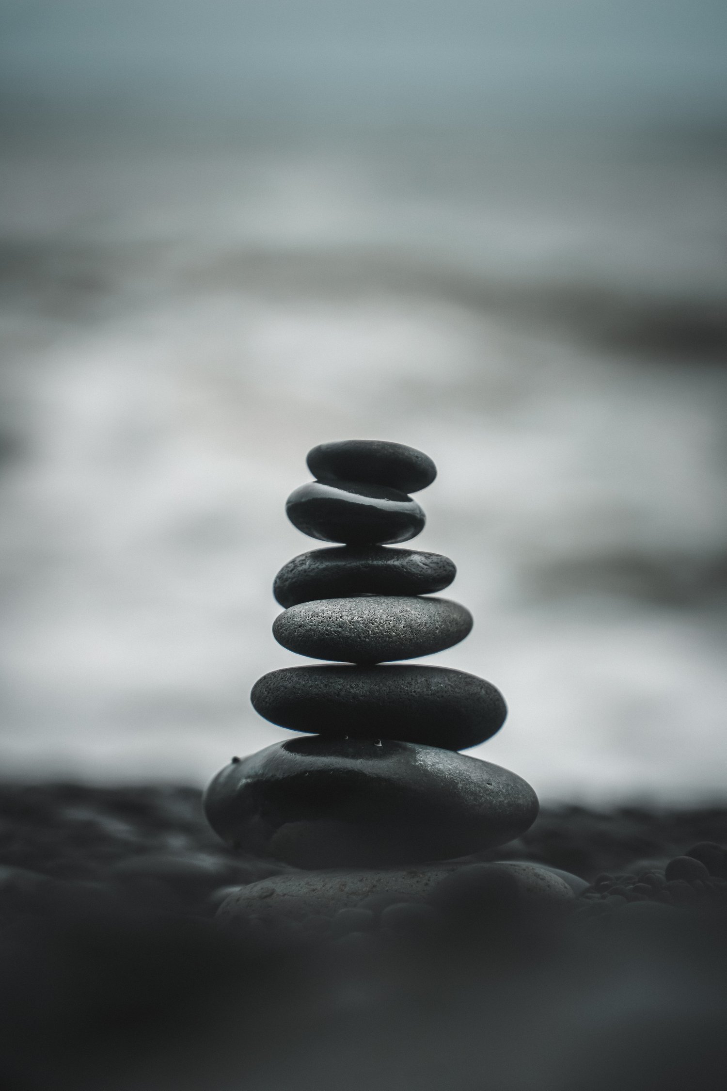 rocks stacked on each other to represent balance