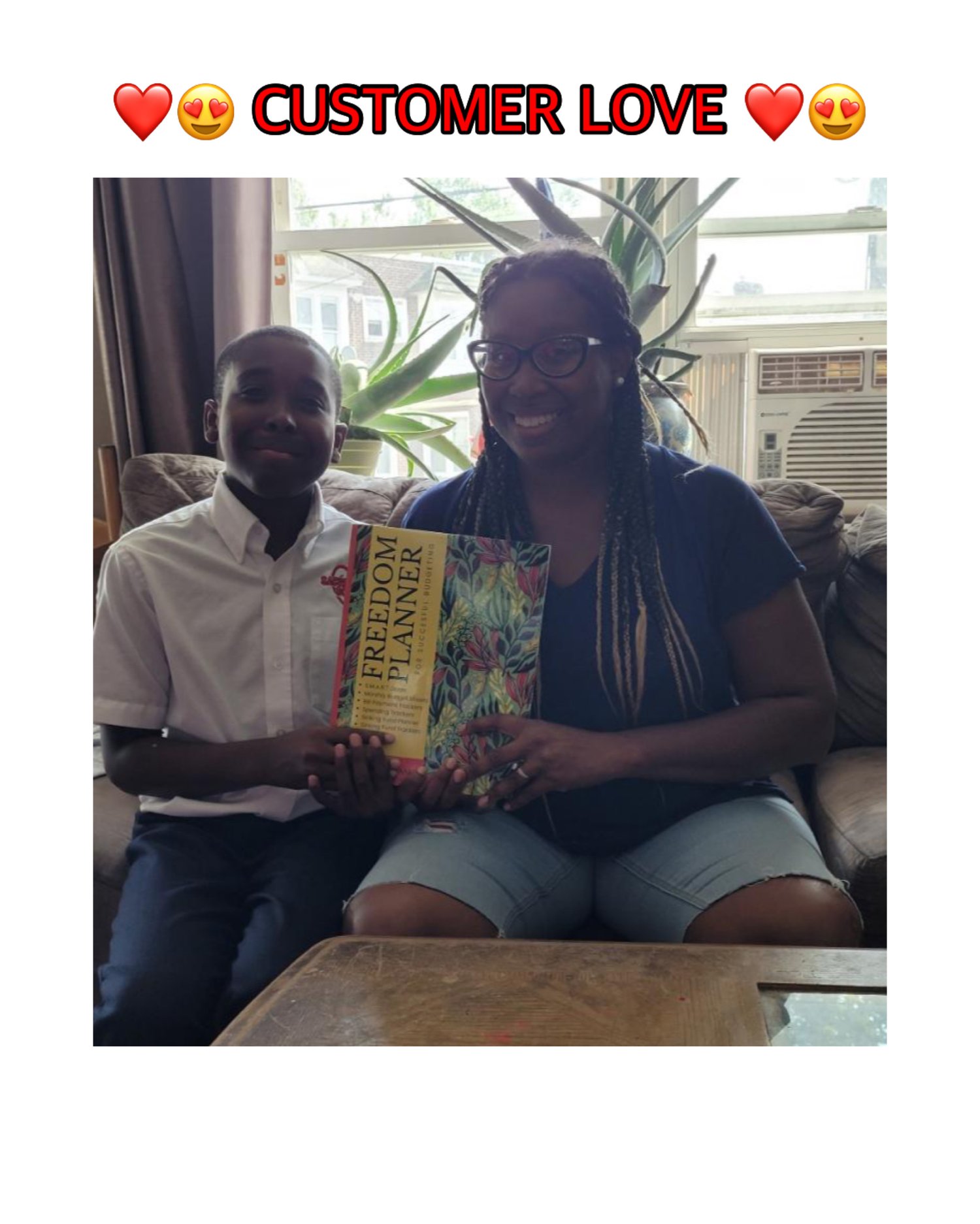Happy Black Customer & Son Holding The Freedom Planner! Manage Your Money Better. Financial Literacy for Families.