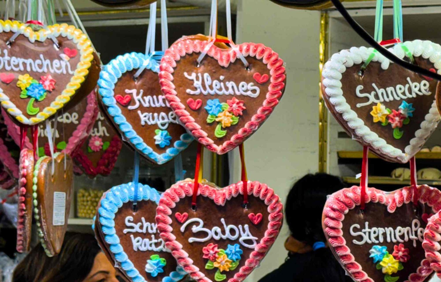 In the heart of Hamburg, the Jungfernstieg Christmas Market becomes a magical tapestry of holiday splendor, adorned with the most beautiful Hamburg Christmas decoration. As the city transforms into a winter wonderland, the market takes its place as a top destination for those seeking the pinnacle of Hamburg Xmas decoration and an unforgettable holiday experience.  On December 6th, St. Nicholas graces the Jungfernstieg Christmas Market with his benevolent presence. In a cherished tradition, he brings sweets and small gifts, creating a moment of joy for children who, in turn, share the spirit of the season through song or poem.  What sets this Christmas market apart is its enchanting identity—the "Weißer Zauber" or White Magic. It captivates with a symphony of glittering lights, numerous craft stalls, and a unique location right on the shores of the Binnenalster. The market becomes a living canvas of festive illumination, where tradition and modernity intertwine to create an unparalleled ambiance.  Culinary delights await visitors at the White Magic on Jungfernstieg. The air is filled with the inviting scents of Feuerzangenbowle and mulled wine, offering a warm respite from the winter chill. Beyond the delectable treats, the market boasts an array of stalls presenting Christmas gifts that range from candles to wooden jewelry and toys, ensuring that every visitor finds a treasure that resonates with the spirit of the season.  As twilight descends upon Jungfernstieg, the glittering lights of the Christmas market cast a warm glow over the surroundings. The unique location on the Binnenalster, with its tranquil waters reflecting the festive lights, adds an extra layer of magic to the experience. It is a visual spectacle, a testament to the top-tier Hamburg Xmas decoration that graces every stall.  In every corner of the market, the most beautiful Hamburg Christmas decoration becomes a showcase of artistry and tradition. The stalls, adorned with festive wonders, invite visitors to embark on a journey through the essence of the season—a journey that is both timeless and contemporary, where the magic of Christmas is not just observed but embraced with open hearts.  Jungfernstieg Christmas Market stands as a testament to the city's commitment to providing a top-tier holiday experience. It is a place where the glittering lights, the crafts, and the culinary delights come together to create a symphony of joy—a celebration that resonates with the unique charm of Hamburg and leaves an indelible mark on the hearts of those who partake in its enchantment.