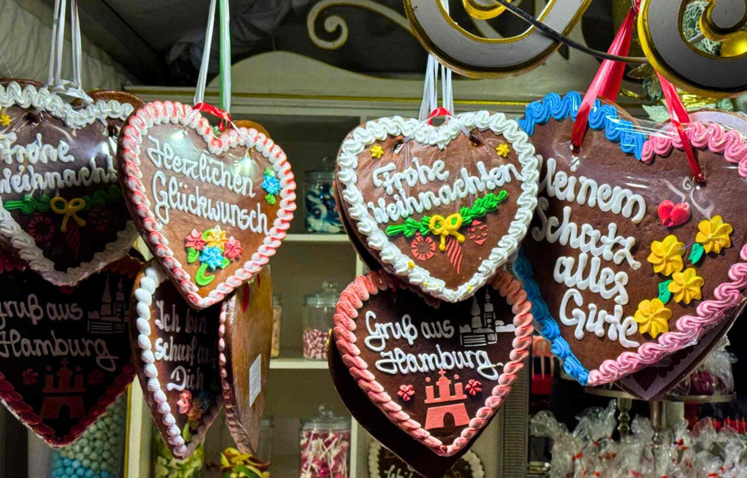 In the heart of Hamburg, the arrival of Christmas transforms the city into a tapestry of festive wonder, with the Jungfernstieg Christmas Market standing as a radiant beacon of holiday enchantment. This celebrated market, known as "Weißer Zauber" or White Magic, is a testament to the city's commitment to providing a unique and unforgettable Christmas experience.  What sets this Christmas market apart is its enchanting identity—the "Weißer Zauber" captivates with glittering lights, numerous craft stalls, and its unique location right on the shores of the Binnenalster. The market becomes a living canvas of festive illumination, where every corner is adorned with the most exquisite Christmas decor in Hamburg. Tradition and modernity intertwine to create an unparalleled ambiance that captivates the soul.  Culinary delights await visitors at the White Magic on Jungfernstieg. Amidst the glittering lights, visitors can indulge in the warmth of Feuerzangenbowle and mulled wine—a treat for the senses that adds an extra layer of magic to the winter festivities. The market further unfolds as a treasure trove of Christmas gifts, with stalls offering an array of delights, from candles to wooden jewelry and toys.  The Jungfernstieg Christmas Market is more than just a destination; it is a radiant Christmas wonder. Its elegant white design provides a festive backdrop that harmonizes with the picturesque location on the shores of the Binnenalster. Here, tradition and modernity meld seamlessly, creating a Christmas experience that is both timeless and contemporary.  The market's charm lies in its ability to merge elements of the past and present. It becomes a celebration of mulled wine, craftsmanship, and a breathtaking atmosphere at the center. The air is infused with the scents of the season, and the surroundings come alive with the sounds of joy and shared moments. In every detail, from the glittering lights to the handcrafted wonders, the Jungfernstieg Christmas Market radiates the essence of a Christmas wonder.  As twilight descends upon the Binnenalster, the market transforms into a dreamscape—a place where the magic of the season is not just observed but fully embraced. The elegant white design becomes a canvas for the festive lights, and the picturesque location amplifies the enchantment, offering a respite from the winter chill and inviting visitors to savor the beauty of Christmas in Hamburg.  In every sense, the Jungfernstieg Christmas Market stands as a radiant testament to the city's holiday spirit. It is a place where Christmas becomes a sensory journey—a symphony of lights, scents, and flavors that transcends time and creates an indelible mark on the hearts of all who step into its magical embrace.