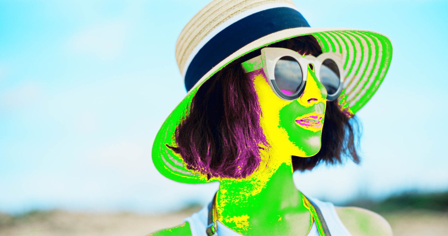 A womans skin is keyed out by the Davinci Resolve Powergrade.