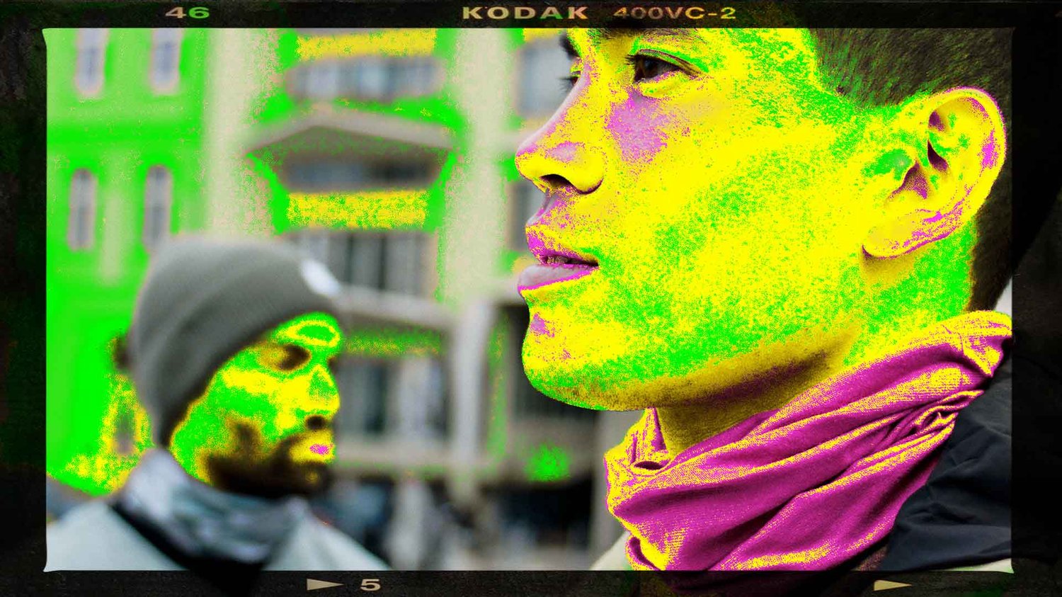 Yellow and green key out the skin tones on two males.