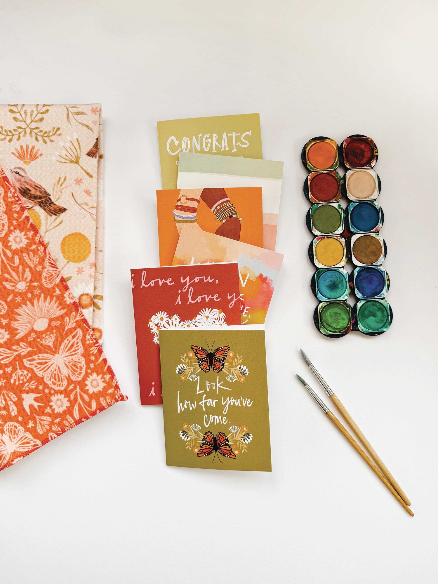 Flatlay image of hello friend thinking of you greeting card with bridal shower monogram card and matching recipe card with elegant watercolor in delft blue style