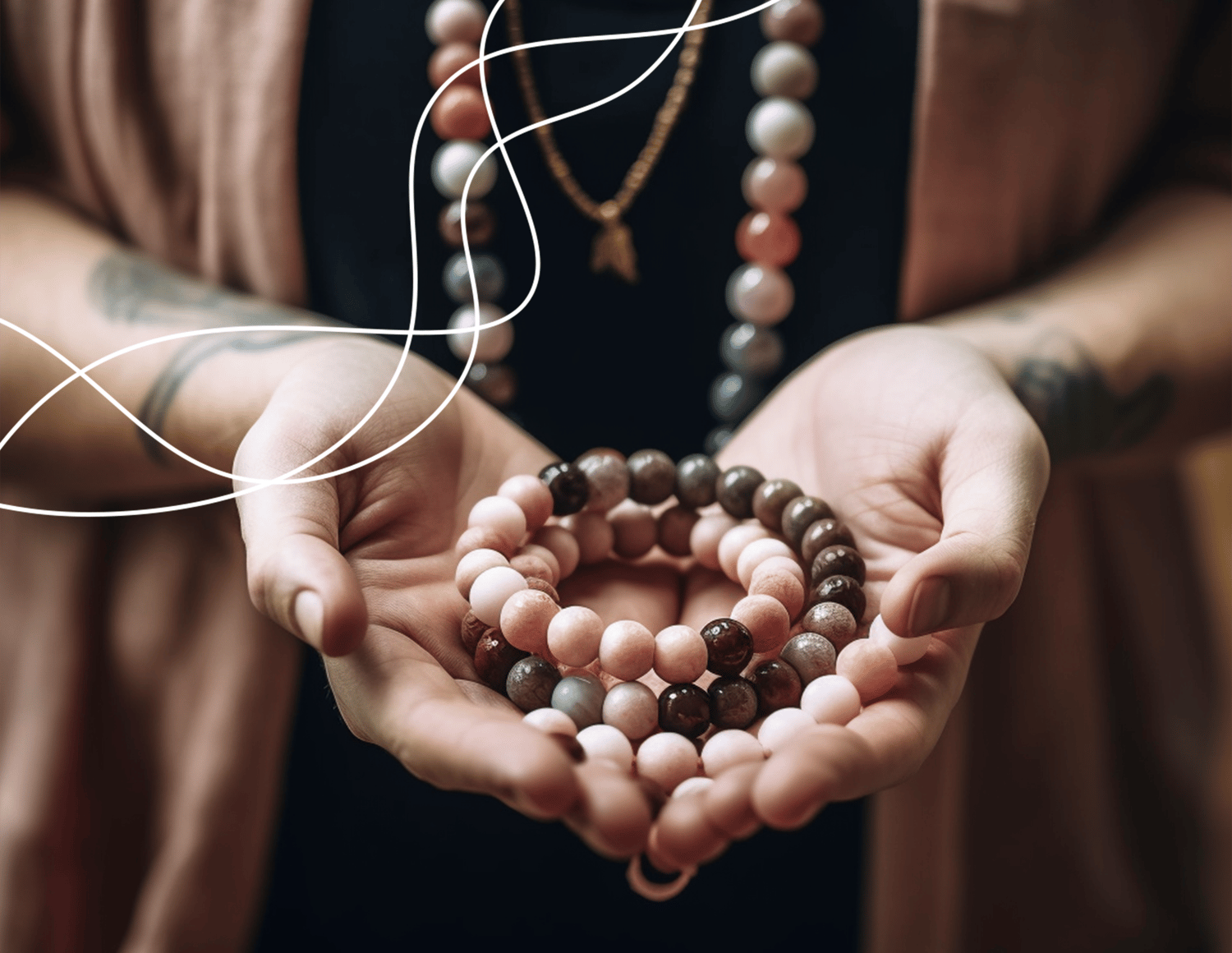 hands holding mala beads