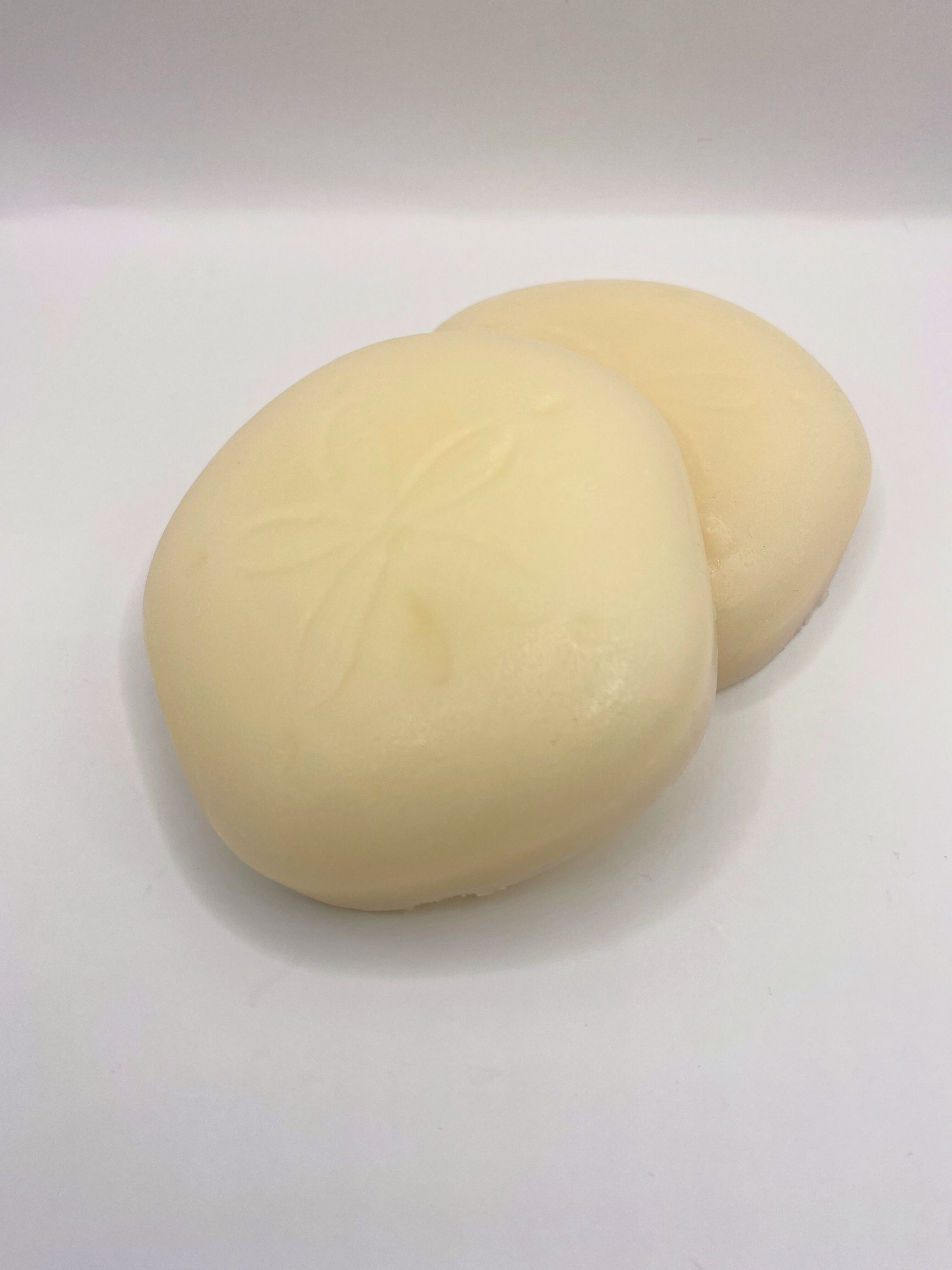 Two round hair conditioner bars