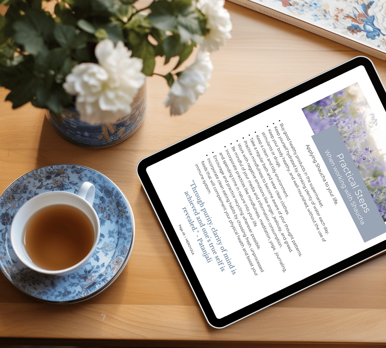 table top with journal on tablet