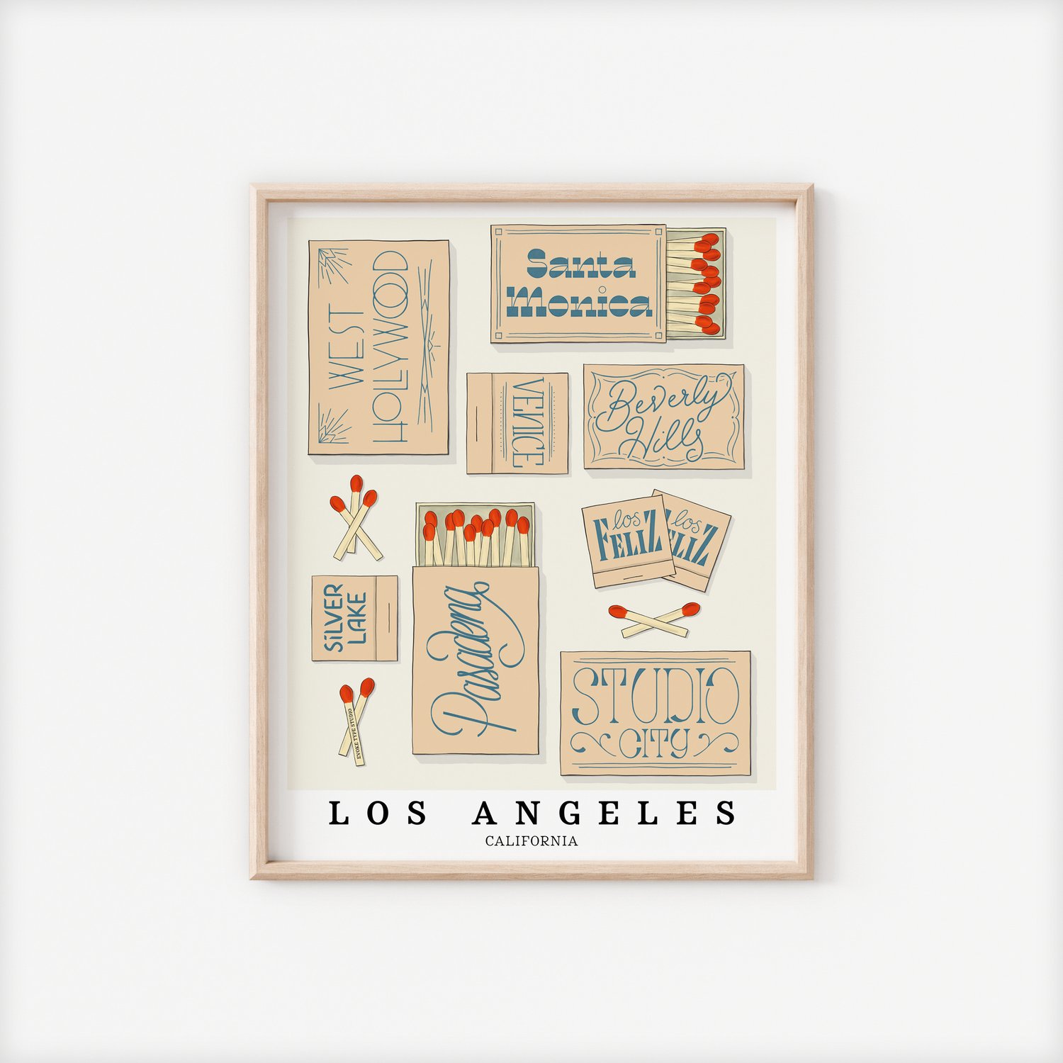 A framed picture of Los Angeles, California neighborhoods drawn in various lettering styles on matchboxes. Artwork has a beige and blue color scheme.