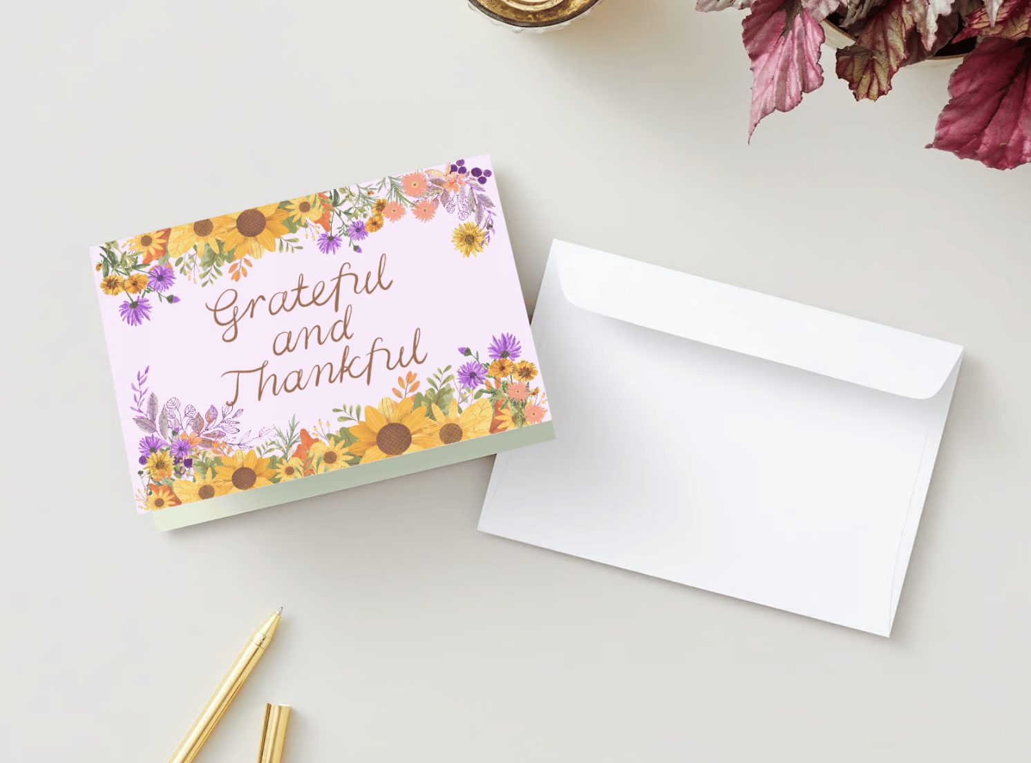 Customizable Vibrant Floral Abundance Folded Card Landscape | Digital Canva Template. Mock outside front view with envelope