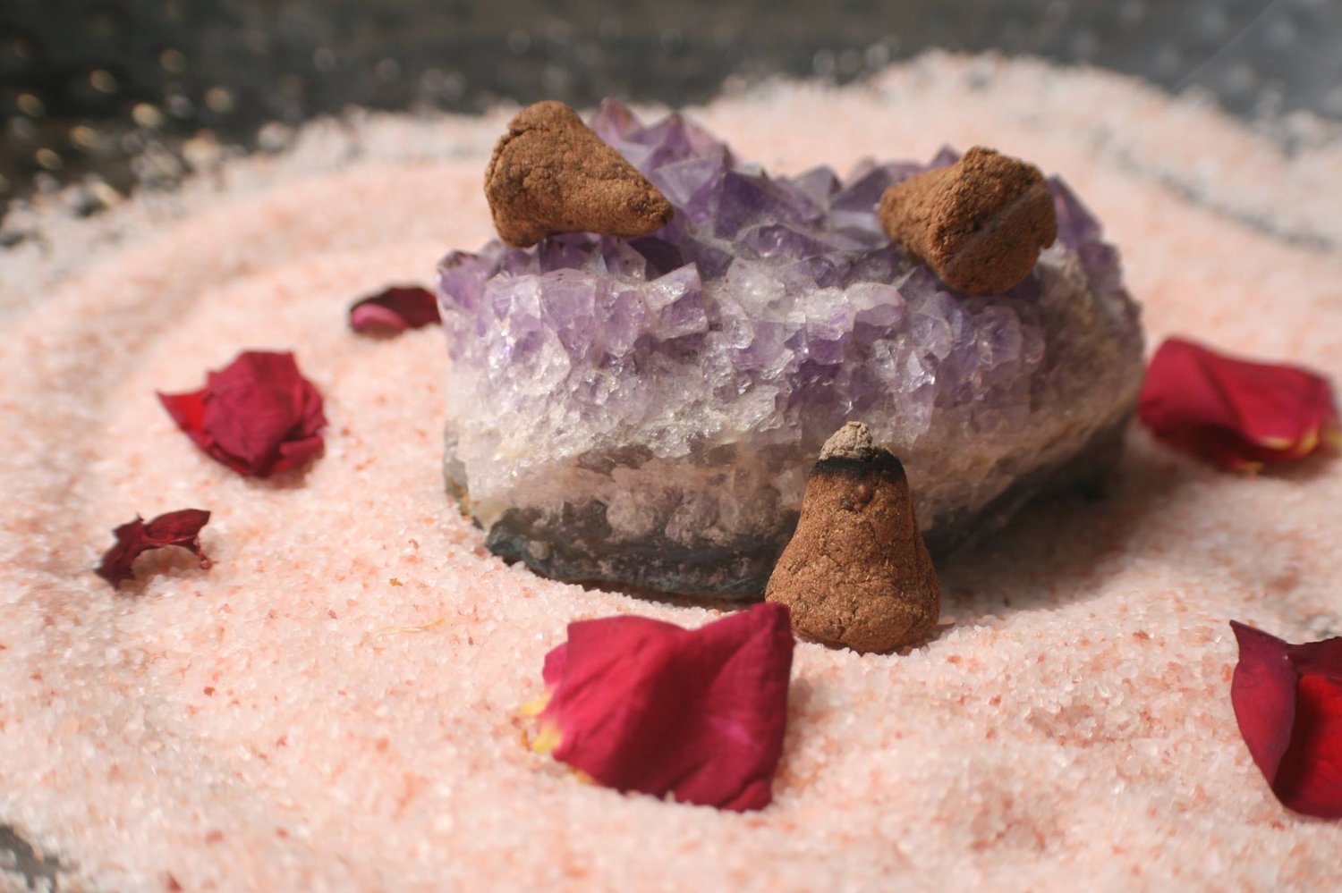 amethyst, incense cones, rose petals, salt, guru circles