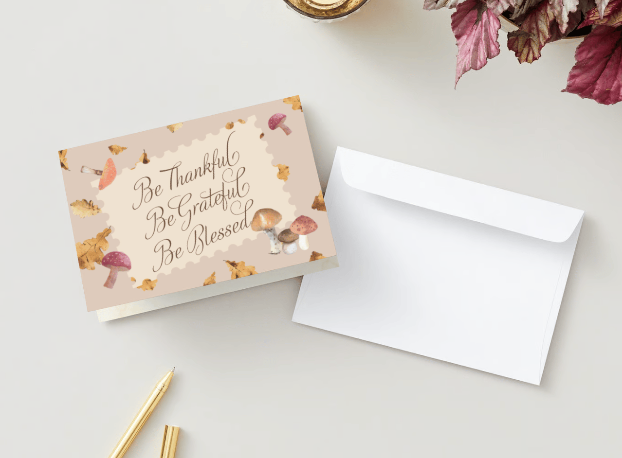 Customizable Warm Autumn Leaves Design Folded Card Landscape | Digital Canva Template. Mock card outside front view