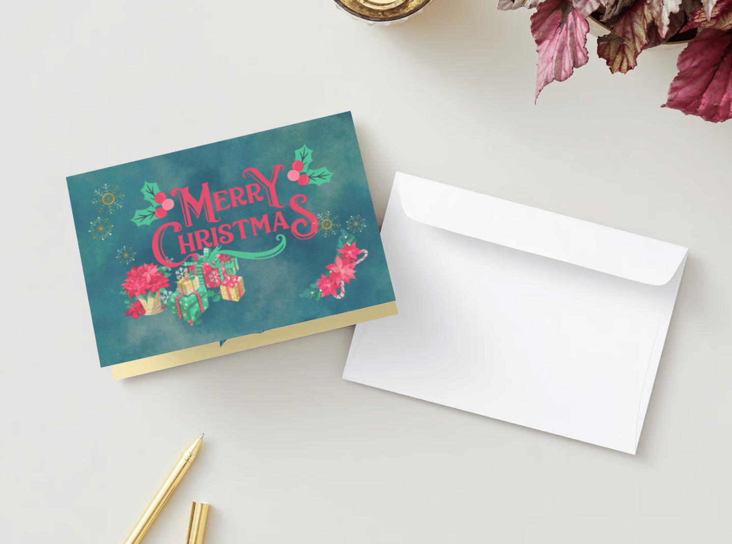 Customizable Festive Poinsettia Christmas Gifts Folded Card Landscape | Digital Canva Template. Mock card outside front view with envelope