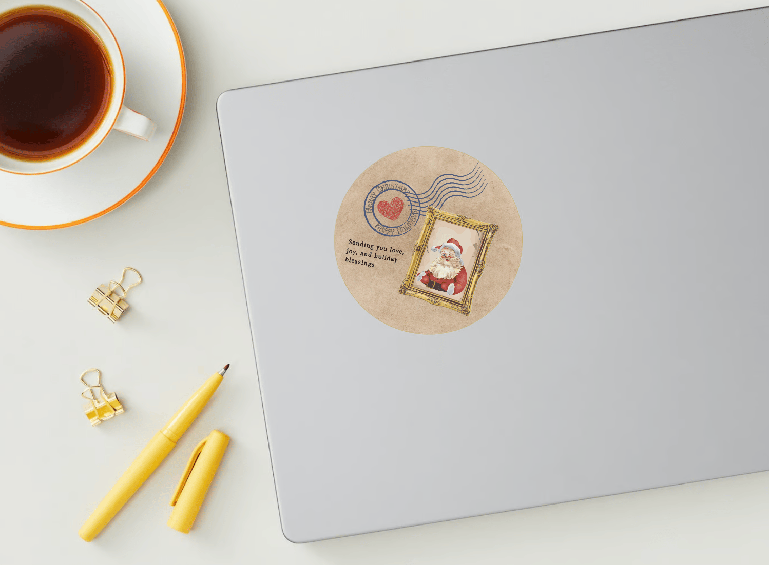 Customizable Vintage Santa Postcard Circle Sticker | Digital Canva Template. Mock sticker on laptop