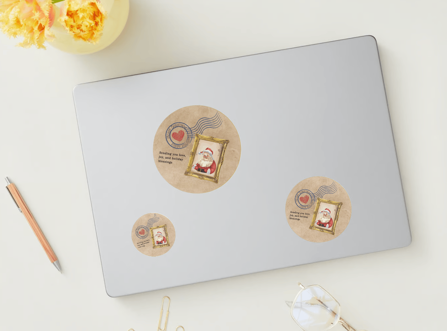 Customizable Vintage Santa Postcard Circle Sticker | Digital Canva Template. Sticker in various sizes on laptop