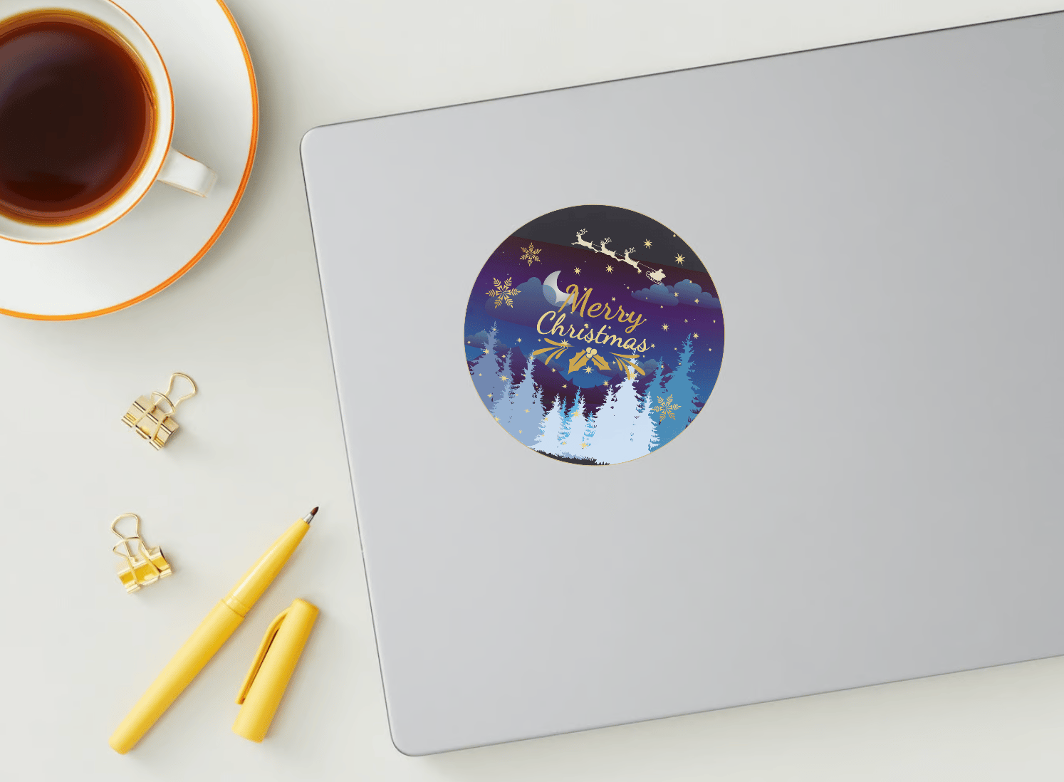 Customizable Starry Night Santa Sleigh Circle Sticker | Digital Canva Template. Mock circle sticker on laptop