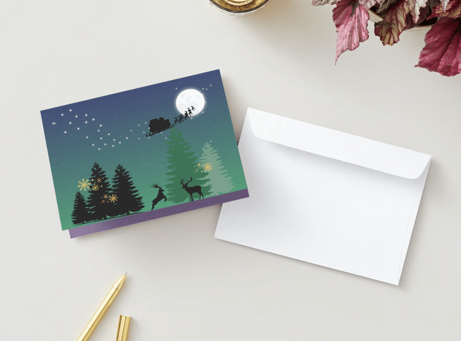 Customizable Aurora Night Santa Sleigh Folded Card Landscape | Digital Canva Template. Mock card outside front view with envelope
