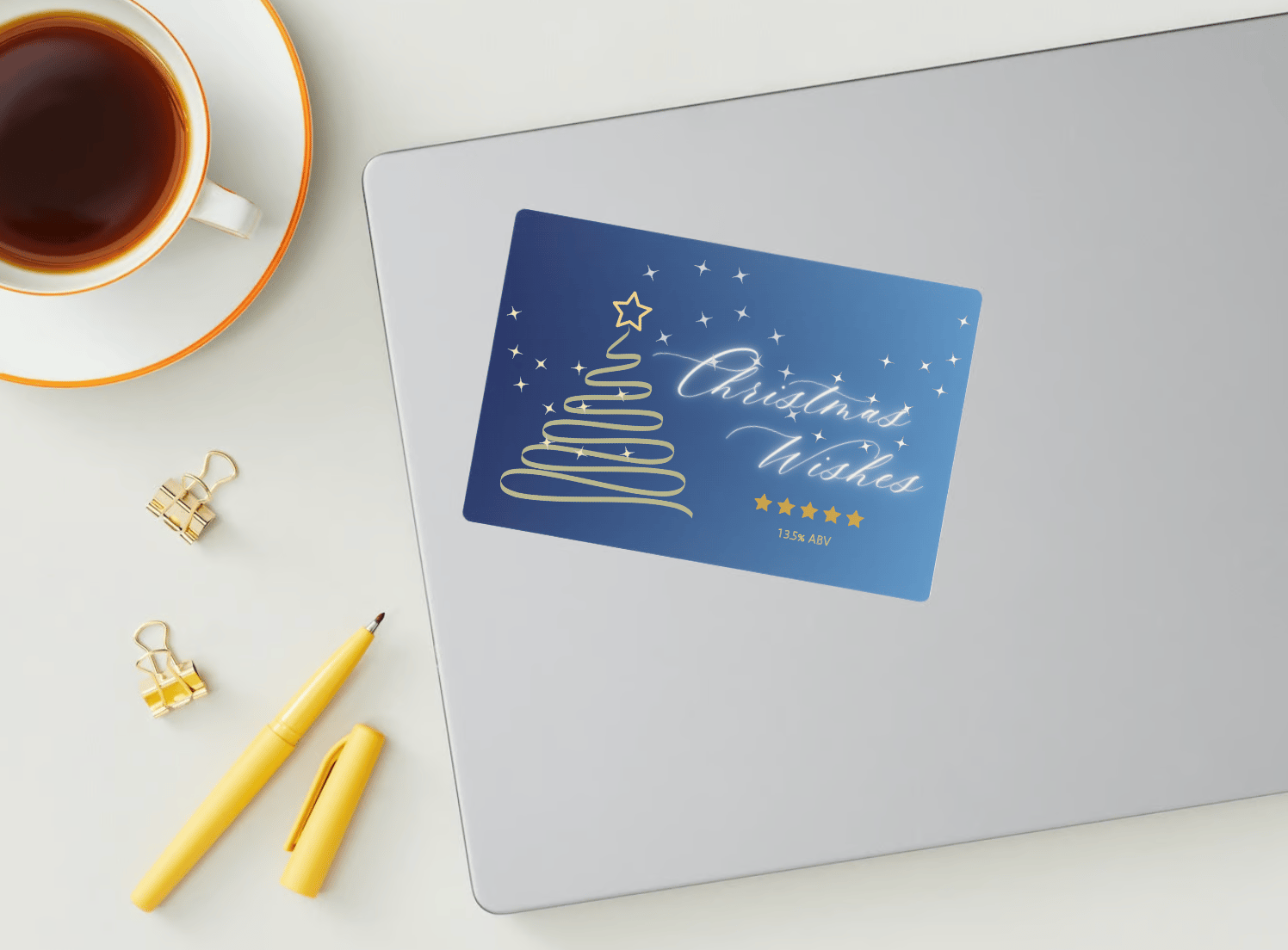 Customizable Minimalist Christmas Wishes Sticker Label 6"x4" | Digital Canva Template. Mock sticker on laptop