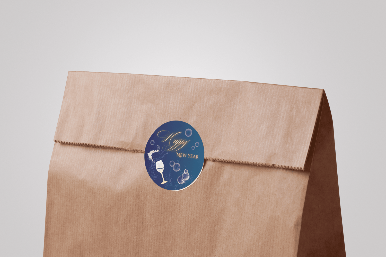Customizable Elegant New Year Toast Circle Sticker | Digital Canva Template. Mock sticker on paper bag