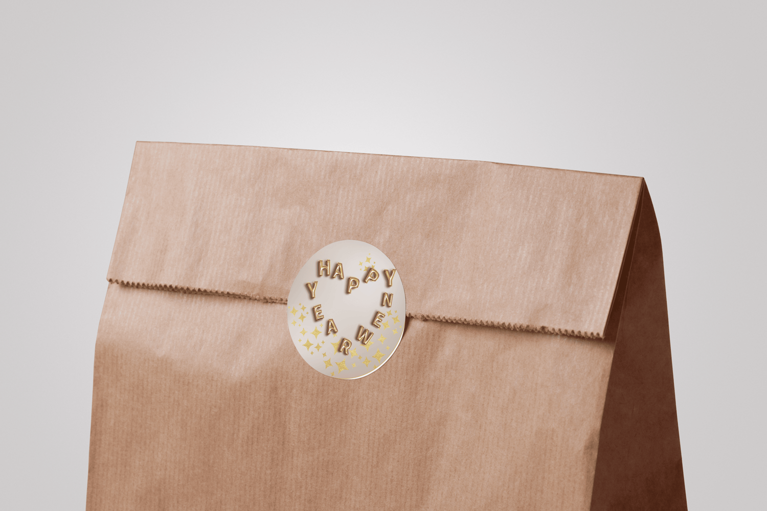 Customizable Heart-Shaped New Year Balloons Circle Sticker | Digital Canva Template. Mock sticker on paper bag