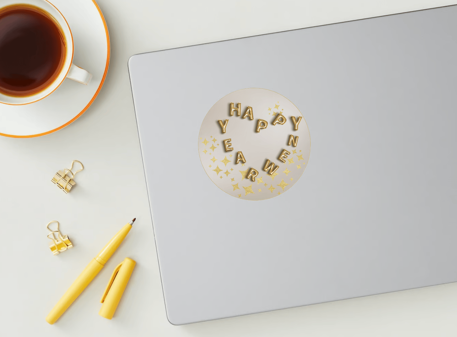 Customizable Heart-Shaped New Year Balloons Circle Sticker | Digital Canva Template. Mock sticker on laptop