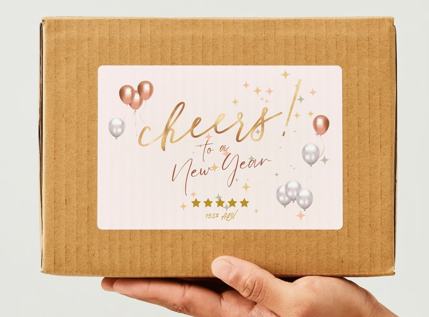 Customizable Cheers to New Year Celebration Sticker Label 6"x4" | Digital Canva Template. Mock sticker on box
