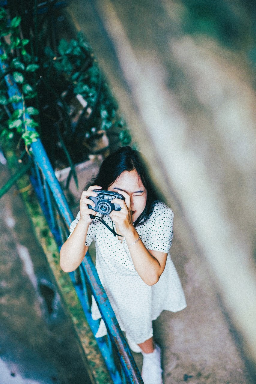 Niña, cámara y fotografía