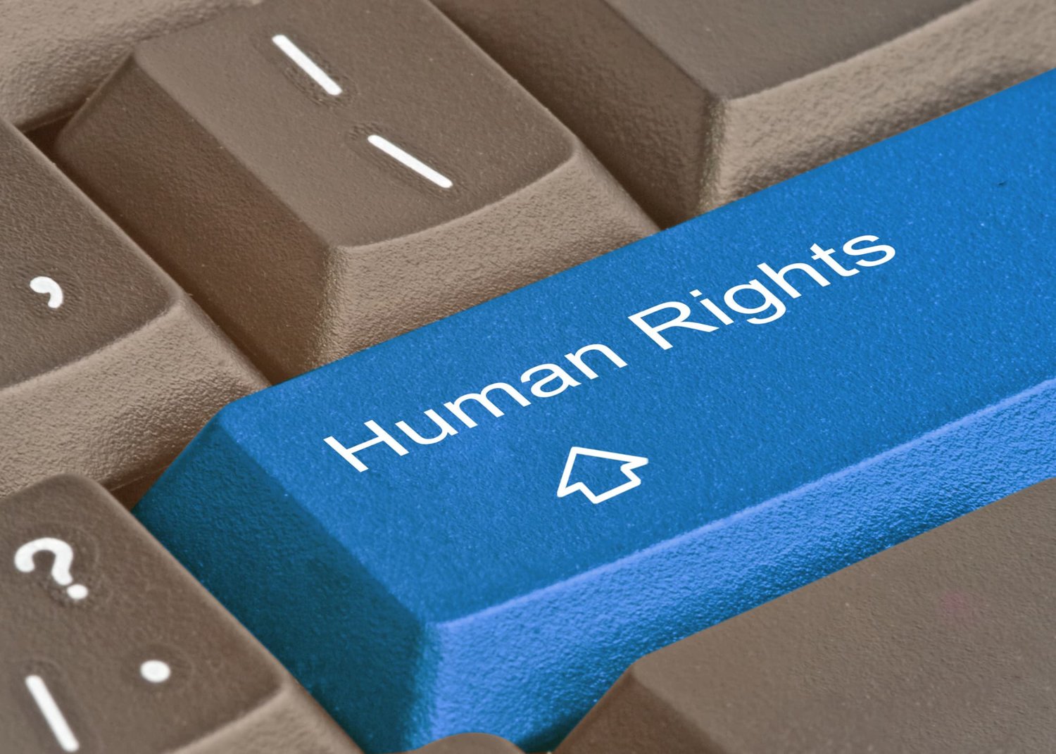 blue keyboard button that reads human rights