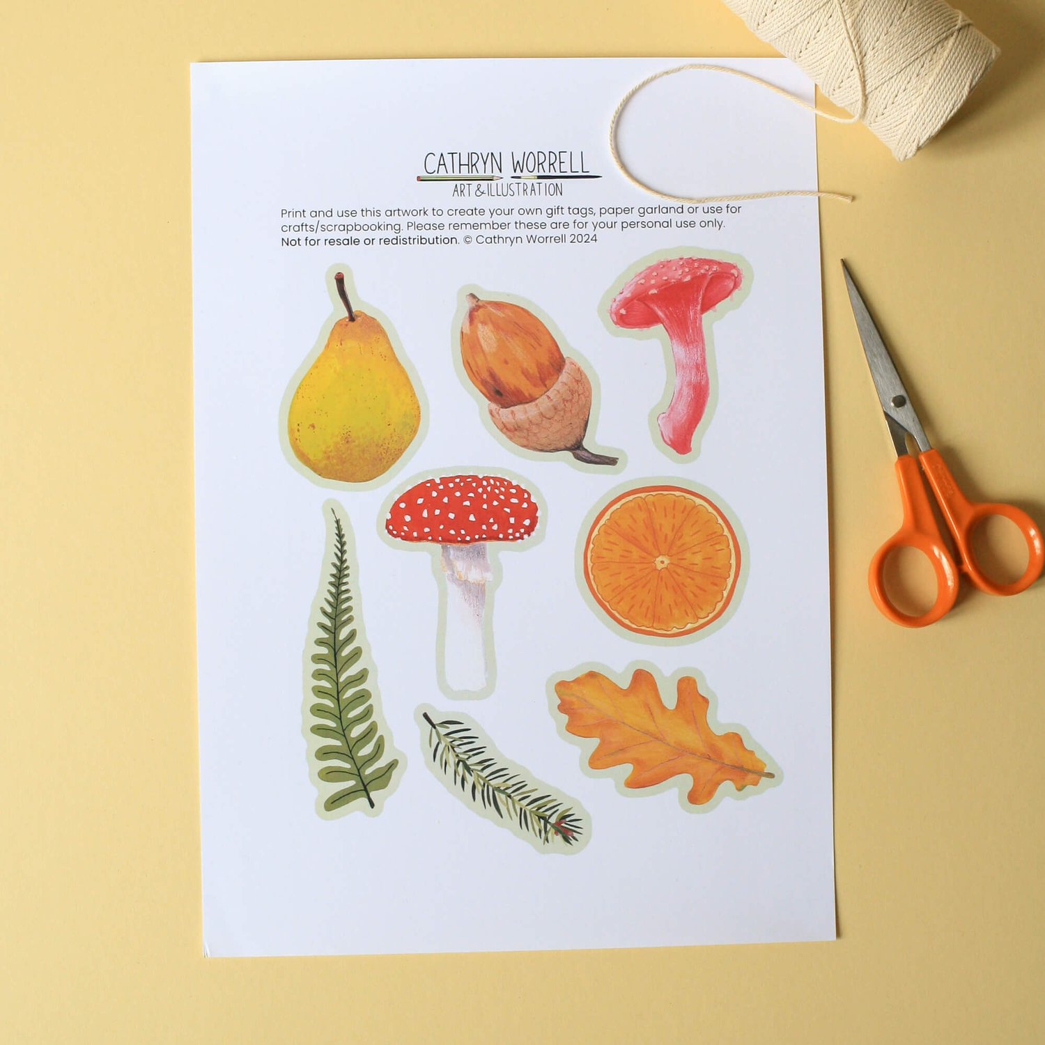 8 illustrations of leaves, fruit and mushrooms printed onto A4 paper alongside scissors and string